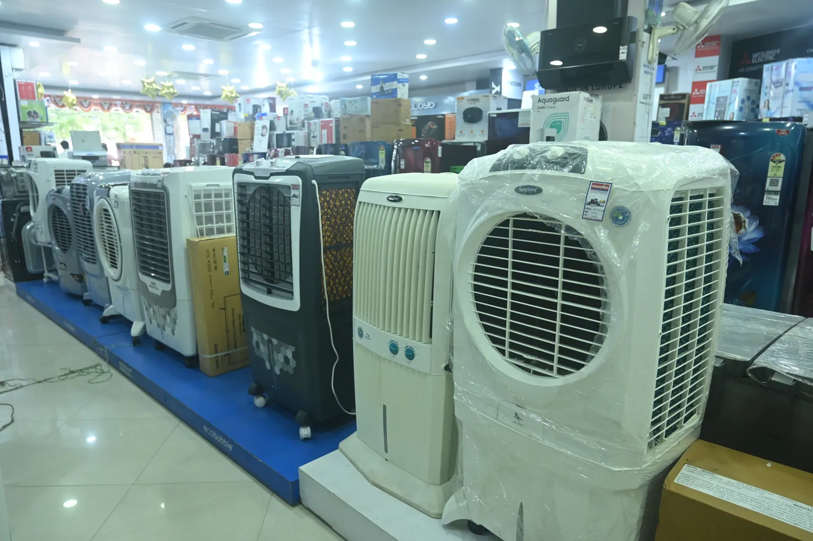 Air coolers and appliances on display